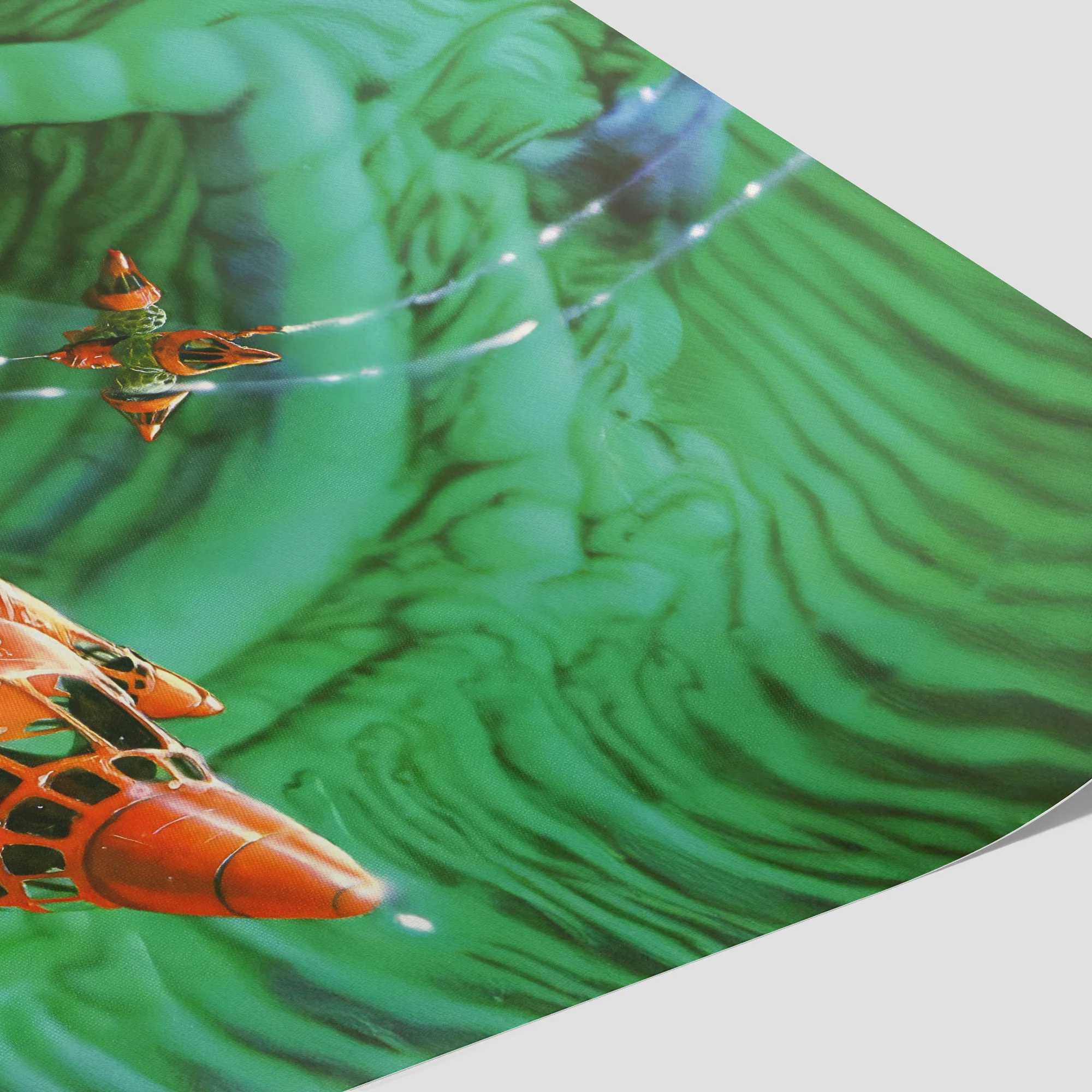 Orange spacecrafts flying over swirling green alien landscape.