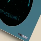 Spacewar game screen on vintage monitor