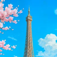 Close-up of the Eiffel Tower with blue skies and fluffy white clouds.