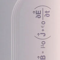 Close-up of the four Maxwell equations typeset in black and violet on a glowing surface.