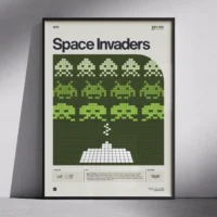 Framed Space Invaders poster showing iconic green alien sprites descending on a grid background.