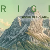Close-up of Mount Triglav rising above alpine forests